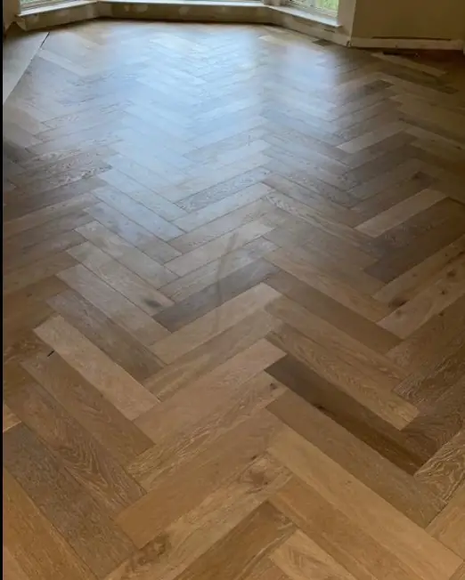 Herringbone wood floor installation